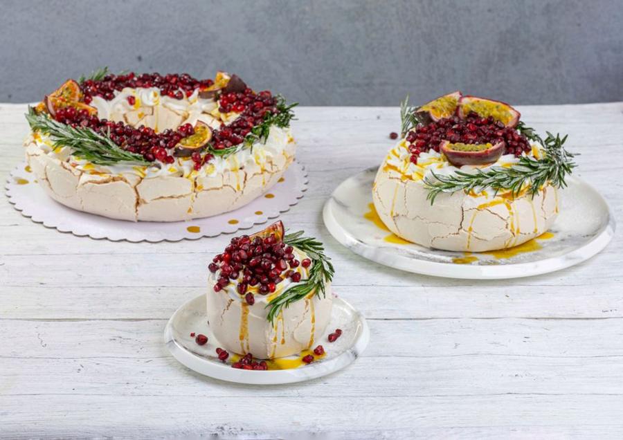 Pomegranate passion fruit pavlova cakes