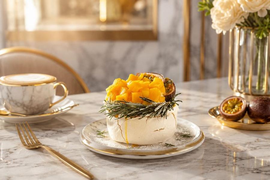 Mango passion fruit pavlova with tea